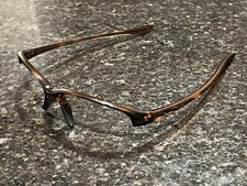 legit Oakley UNSTOPPABLE polish Rootbeer frame only 9191