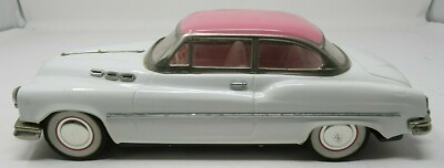 Vintage Pink & White 1950's Buick Sedan Tin Toy Friction Car Coupe Two Doors