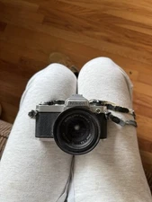 Nikon FE 35mm SLR Film Camera with 28mm 1:28  Nikon Lens Series E