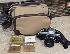 Nikon FA Chrome 35mm SLR Film Camera w/ Bag And Accessories. NICE