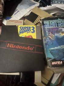 Nintendo NES Console with Controllers, Super Mario Bros. 3 & Silent Service