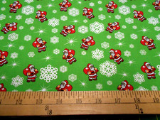 1 Yard Santa Snowflakes on Green Christmas Fabric