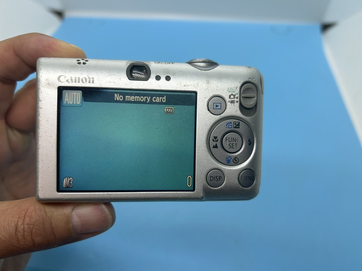 Canon DIGITAL IXUS 95 IS PC1355 10MP Digital Camera. Powers Canon DIGITAL IXUS 95 IS PC1355 10MP Digital Camera. Powers