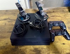 Sony PlayStation 4 With Two Controllers Two charging Stations and Monitor