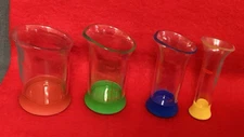 OXO GOOD GRIPS 4 PC SET OF SMALL STACKING MEASURING BEAKERS- UP TO 2 OZ & 4 TBSP