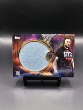 2025 Topps Universe WWE - #WAU-RRE Roman Reigns Match Used Relic /199