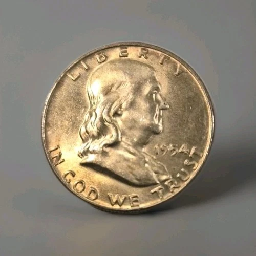 1954 D Franklin Silver Half Dollar. Lightly Colored Uncirculated.