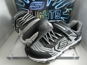 black and silver skechers
