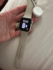 Apple Watch SE 2022 40mm Starlight Aluminum Case with Sport Band, M/L GPS...
