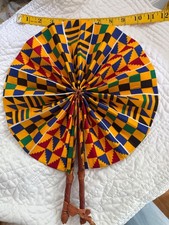 handcrafted African Kente print folding fan with leather handles, often used for