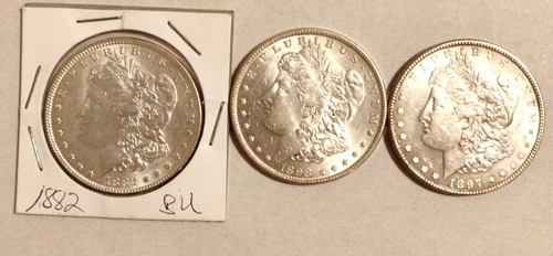 LOT OF THREE BU MORGAN DOLLARS