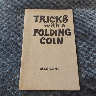 Tricks with a Folding Coin  Magic .Inc 