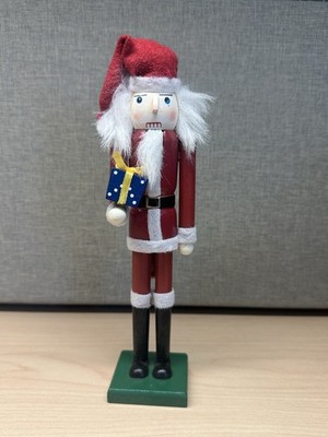 2010 Wooden Santa Nutcracker Christmas Figurine Holding Gift 9  Holiday Decor