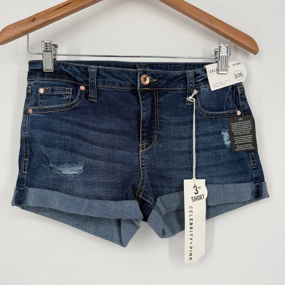 Pantalones cortos de mezclilla rosa celebrity desgastados con puños azules 3 26 para mujer Foto 2 de 4