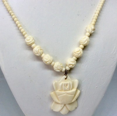 Carved Rose Necklace Is Off White 