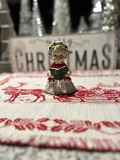 Vintage Ucagco Ceramics Japan Shopper Girl with Song book 