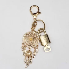 100% Authentic Louis Vuitton Gold lock & Key with Unbranded Bagcharm, Keychain