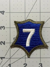 WW 2 US Army 7th Corps OD Border Ribbed Weaved Patch Inv# K7282