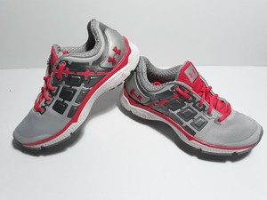 pink and gray under armour shoes