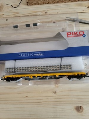 Piko 24501 Flachwagen mit Betonschwellenstapel, Bauzug, H0