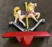 Vintage Cast Iron Stocking Holder Rocking Horse Toys Garland on Red Heavy Base