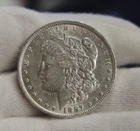 1887 O  US Morgan Dollar $1 AU (Cleaned)