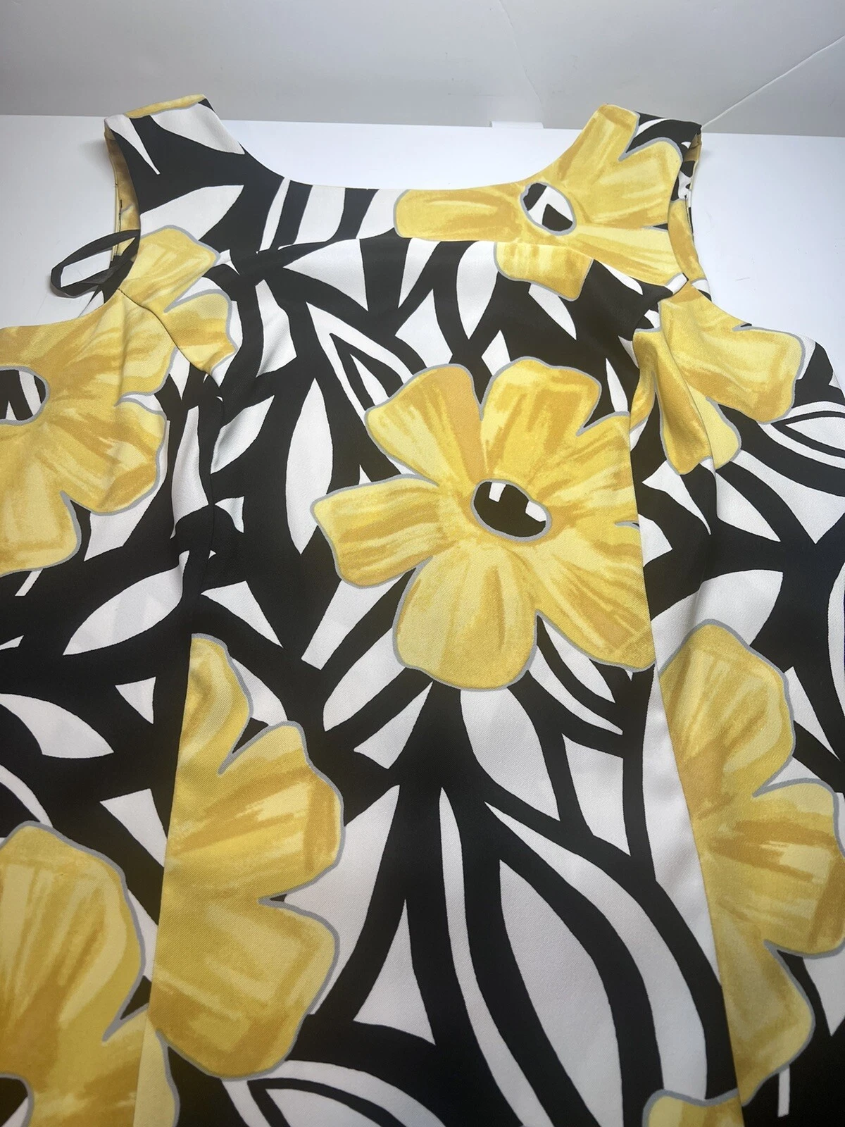 Cerniera posteriore ALYX elastica senza maniche 14 W nera fiori gialli vestibilità affusolata