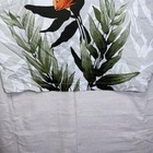 Vintage Wyland AFTCO Bluewater men’s Hawaiian shirt with orange fish rayon and green leaf pattern on white background.