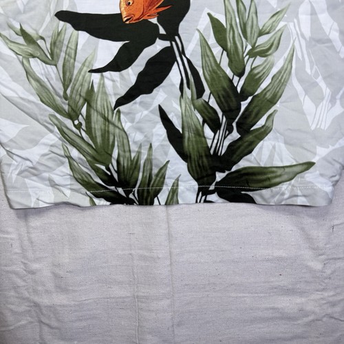 Vintage Wyland AFTCO Bluewater men’s Hawaiian shirt with orange fish rayon and green leaf pattern on white background.