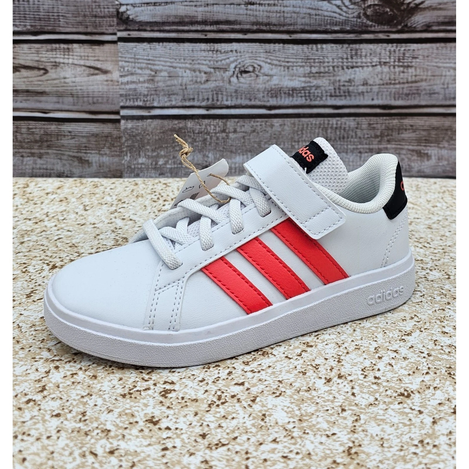 Scarpe per bambini Adidas Grand Court 2.0 EL bianche a righe arancioni taglia 11K