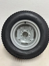Carlisle Wheel & Tire Assembly 23 x 10.50 - 12 NHS 5 Lug Turf Thread Offset Hub