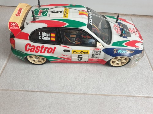 Tamiya 1/10 Big Scale Belt drive TOYOTA COROLLA WRC C. SAINZ y L. MOYA Español - Imagen 12 de 23