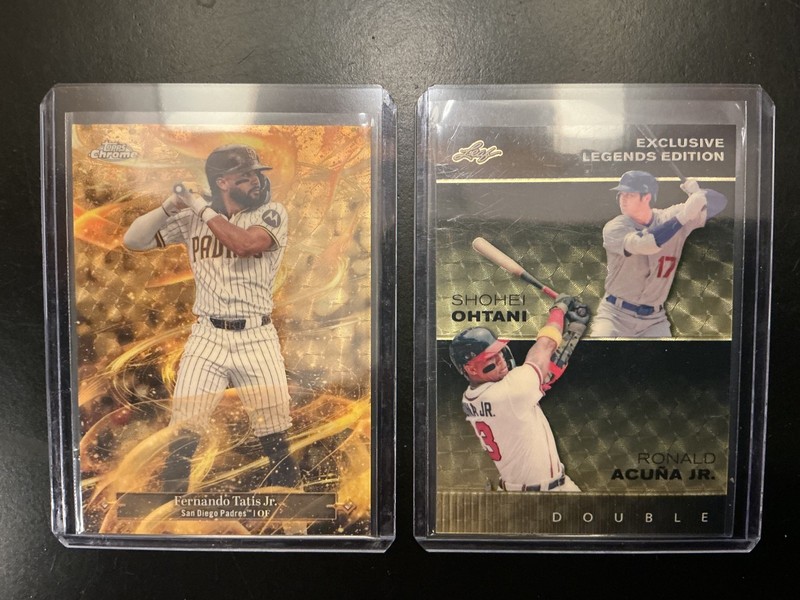 fernando tatis topps gilded gold storm 1/1 and a super gold prismtic shohei 1/1