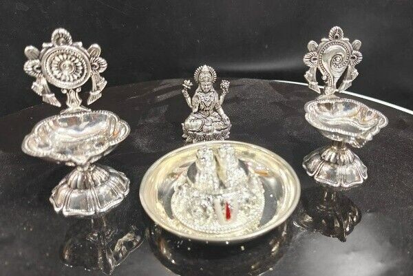 silver plated lakshmi idol with shaunku chakra diya lakshmi charan pooja set 3