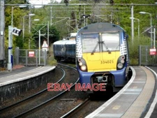 PHOTO  CLASS 334 NUMBER 334021 DRAWING INTO THE  HILLFOOT STATION STATION. 2019