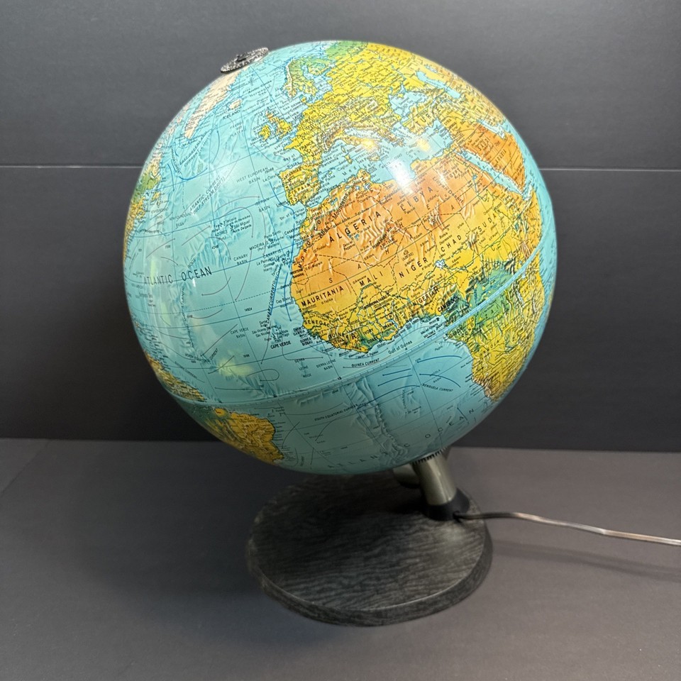 A 1979 Scan Globe that doubles as a warm lamp — Danish design, pre-USSR-collapse cartography, and glowing amber light in one gorgeous object.