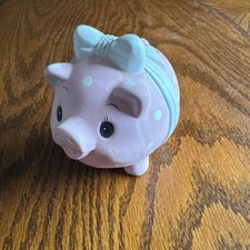 Small light pink ceramic piggy bank pale blue polka dots decorative bow Nursery