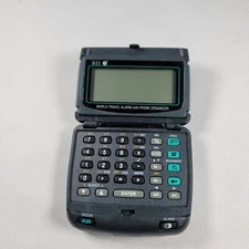 Seiko Instruments Inc World Travel Alarm Mini Size Phone Organizer DF-4022