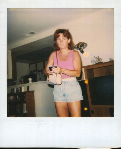 Old Vintage Photo COLOR POLAROID SOLO WOMAN HOLDING PHOTOGRAPH LIVING ROOM