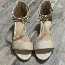 Girls Nine West mini gold. Heels size 5M