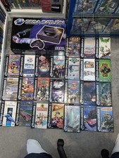 Sega Saturn Console And A Large Selection Of Games Complete With Manuals