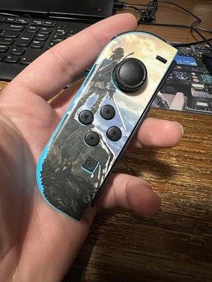 Nintendo Joy-Con (Left) Wireless Controller for Nintendo Switch - Blue With Skin