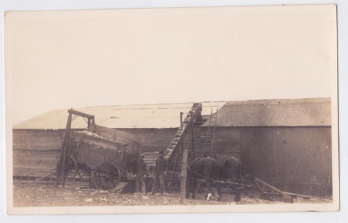 FARMING RPPC LOADING FEED INTO BARN CIRCA 1910 - Picture 1 of 2