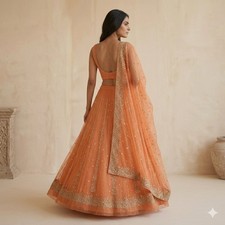 Sanskriti Vintage Orange Net Unstitched Lehenga Hand Embroidered Zardozi Dabka