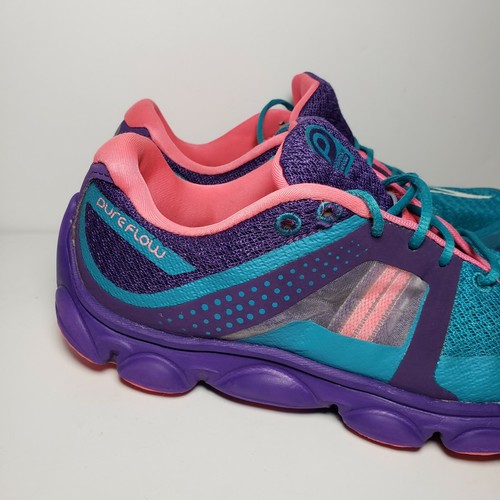 purple and teal tennis shoes