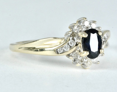 .98 ctw Oval Cut Sapphire with Diamond Accents Ring 10k Yellow Gold
