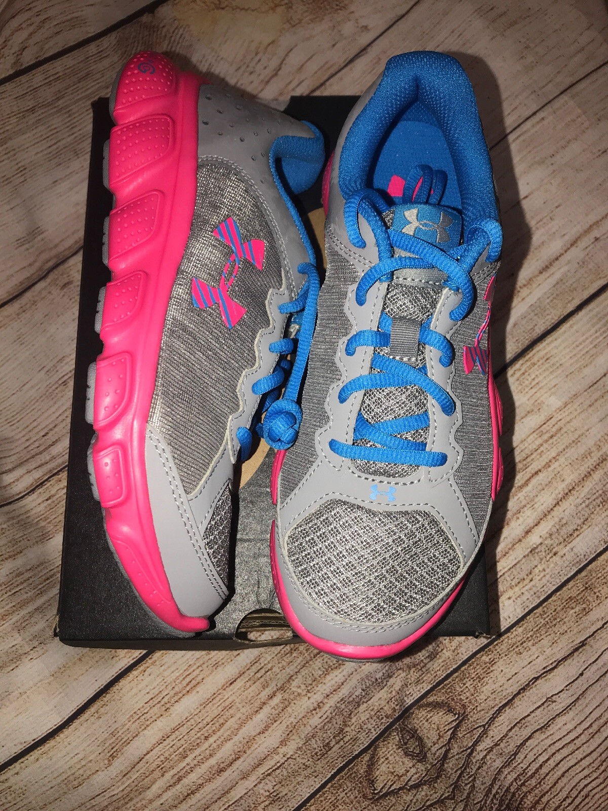 pink and blue under armour shoes