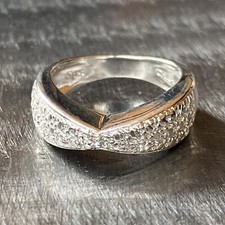 Sterling Silver And Clear Stone Textured Bow ...
