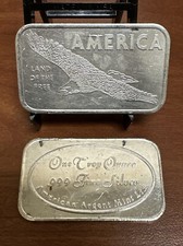 American Argent Mint LTD. "America Land Of The Free" 1 oz .999 Silver Art Bar 85.00 per troy oz