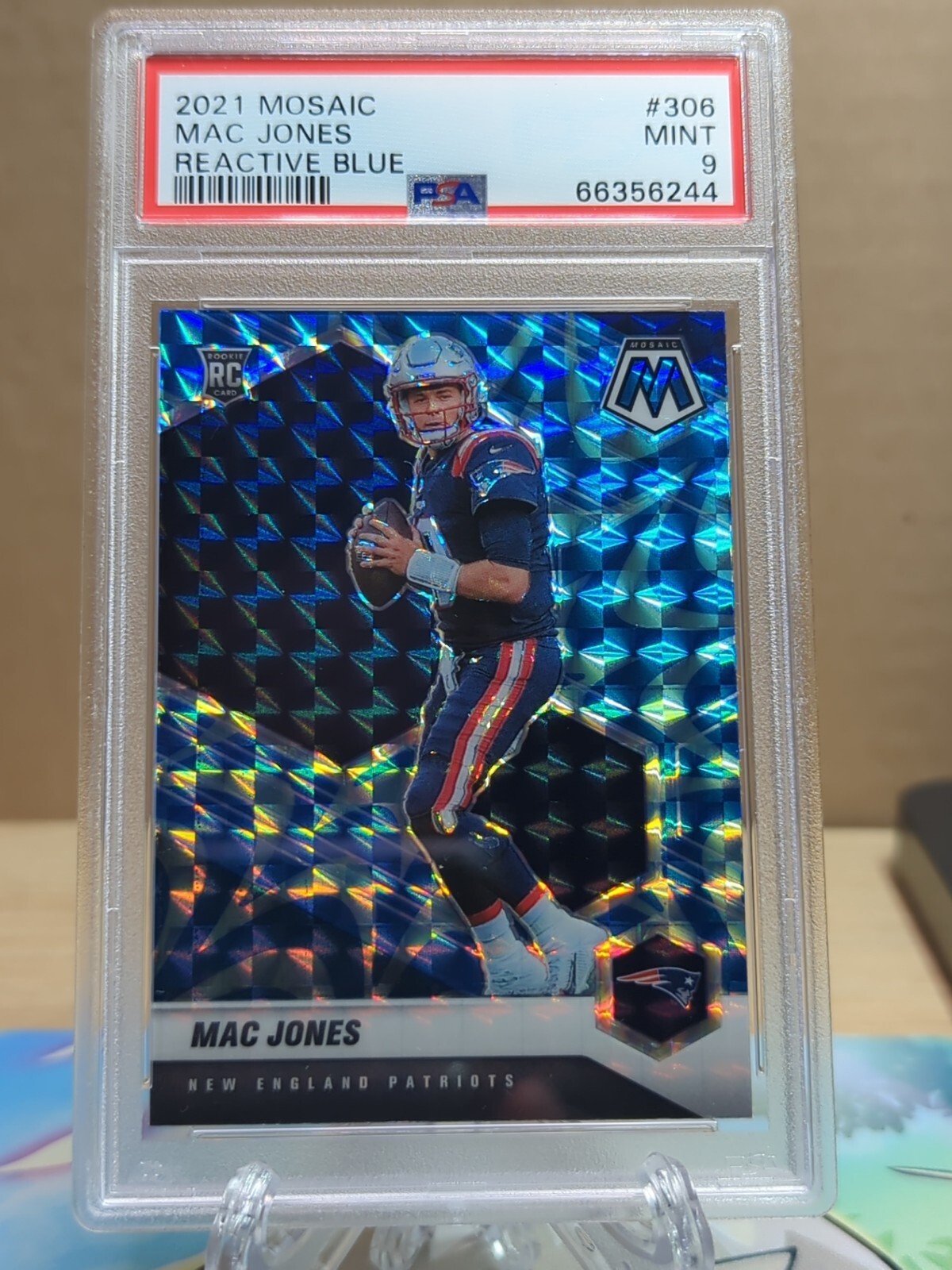 2021 Panini Mosaic Mac Jones Reactive Blue Prizm Rookie RC Patriots #306 PSA 9